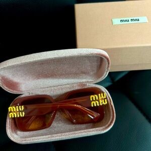 Miumiu sunglasses like new, includes case